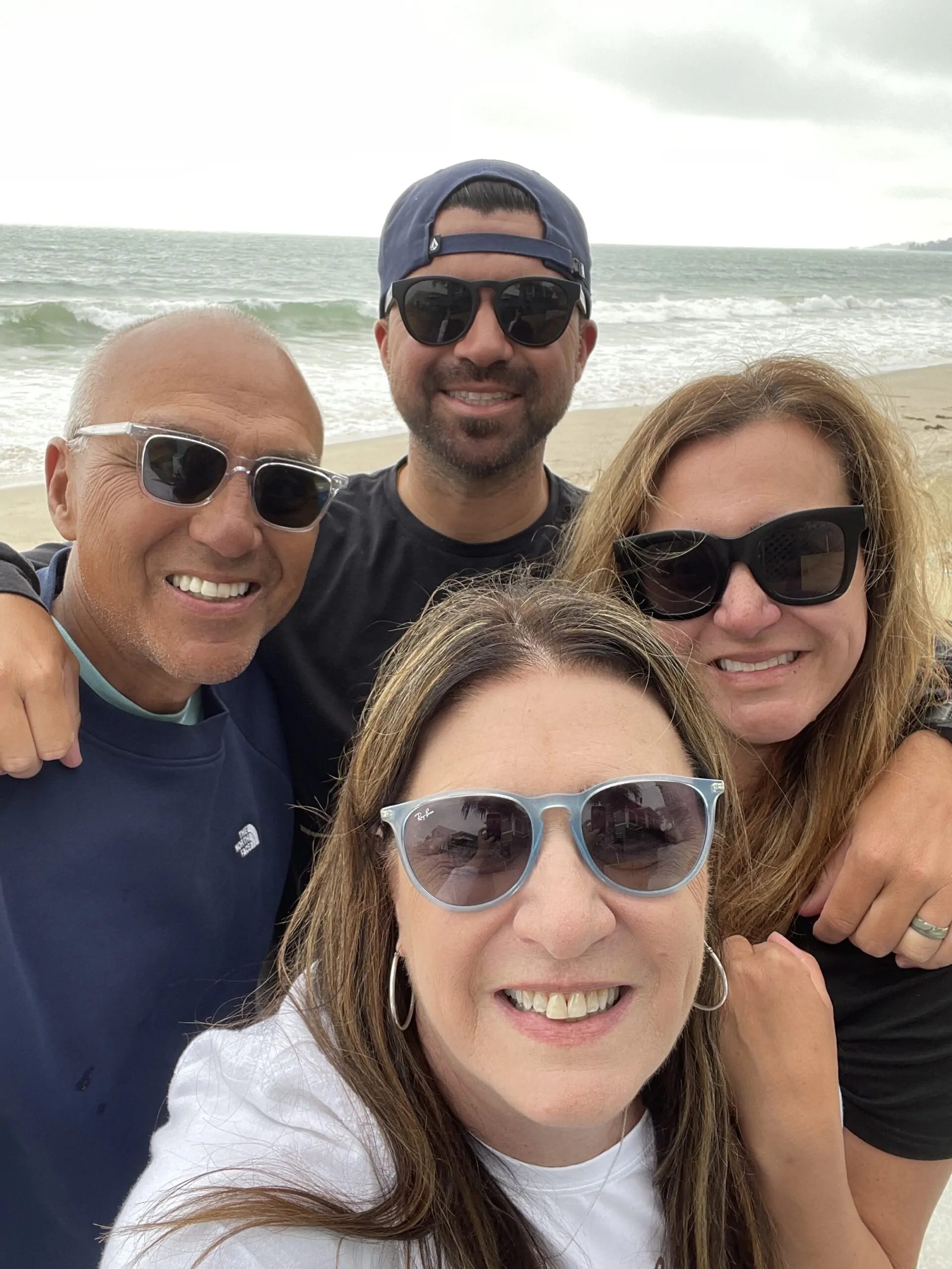 Michael Ramos with his wife and family at the beach