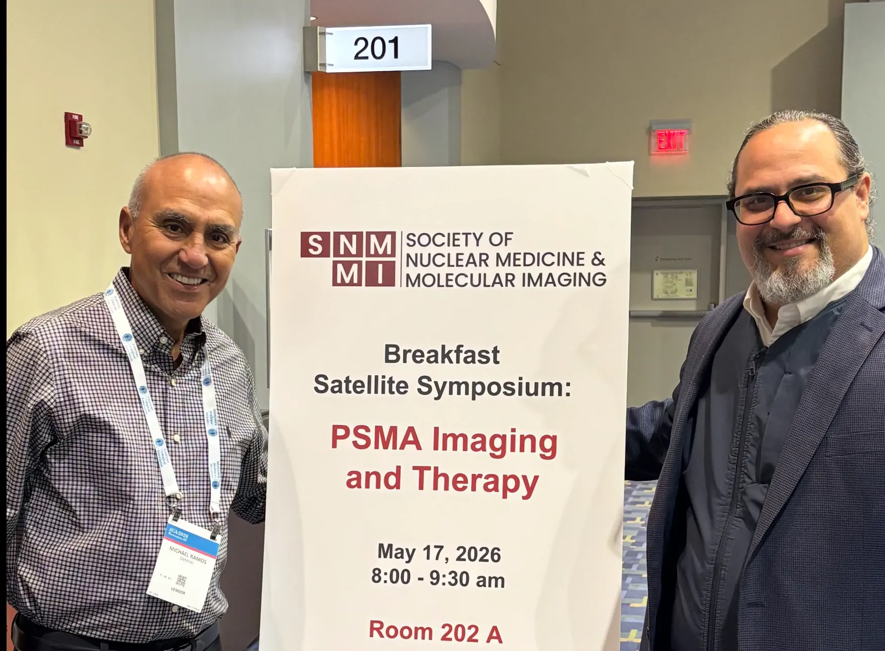 Michael Ramos with Dr. Frankis Almaguel at a PSMA imaging and therapy symposium